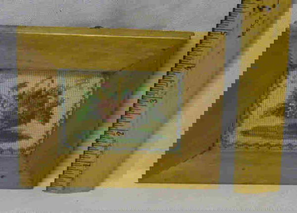 ANTIQUE BEADED PICTURE IN FRAME: 19TH CENT. WOOD FRAME. BLUE BEADED THIN LINE. CENTER W/ MULTI-COLOR FLORAL AND GRAPES IN BASKET. GOLD BEADED INITIALS "T" AND "R" ON EITHER SIDE. BEADED PORTION APPROX. 2.75" X 3.25". W/ FRAME APPROX.