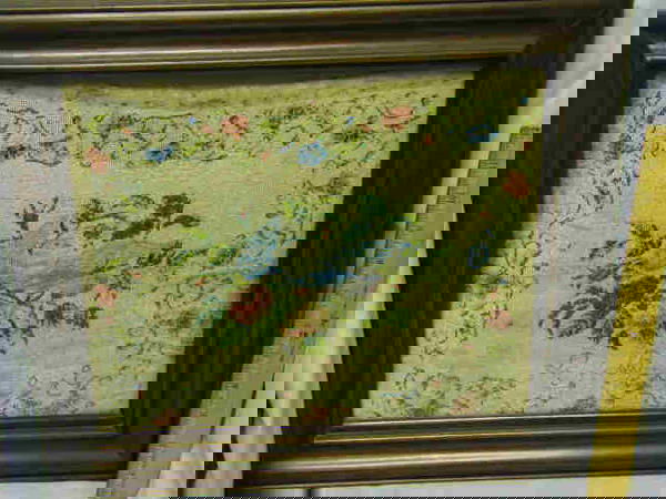 ANTIQUE BEADED PICTURE IN FRAME: 19TH CENT. WOOD FRAME. BEADED CREAM BACKING W/ MULTI COLOR FLORAL BORDER. CENTER W/ BIRD AMONG FLORAL AND FOLIAGE. INITIALS "L B" ON BOTTOM. BEADED PORTION-APPROX. 10.25" X 13.25". W/ FRAME-APPROX. 15