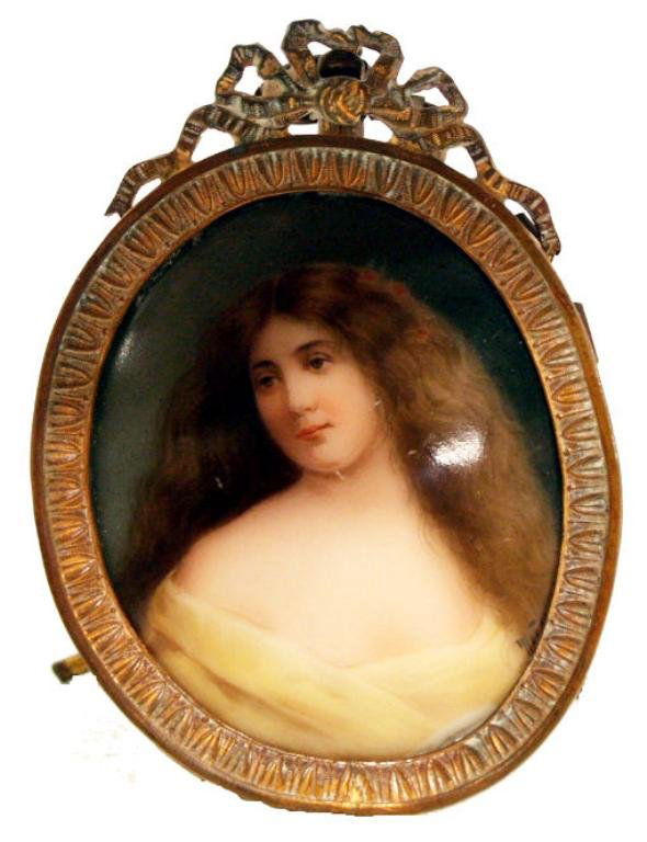 MINIATURE PORTRAIT PAINTING ON PORCELAIN, SIGNED: Framed miniature oil painting on porcelain, 19th c., depicting a beautiful woman with long auburn hair, signed "Wagner" lower right, mounted in a Louis XVI style gilt metal frame, the back porcelain s