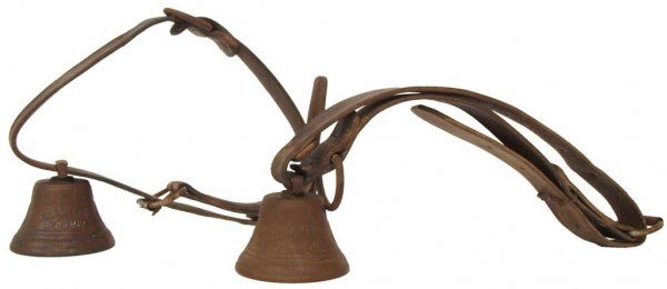 (2) ANTIQUE SWISS COW BELLS, CHIANTEL FONDEUR 1878: (lot of 2) Antique Swiss bronze cow bells reading "Chiantel Fondeur" on one side, and "1878 Saignelecier" on the other, each hanging from a stiff and worn leather strap, one strap with old repair, bel