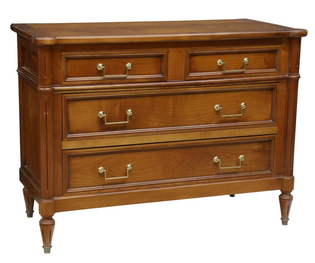 FRENCH LOUIS XVI STYLE FRUITWOOD COMMODE: French Louis XVI style fruitwood commode, 20th c., rectangular case with projecting corner posts, fitted with four drawers, rising on tapered legs, ending in metal-capped feet, approx 32.75"h, 44.25"w