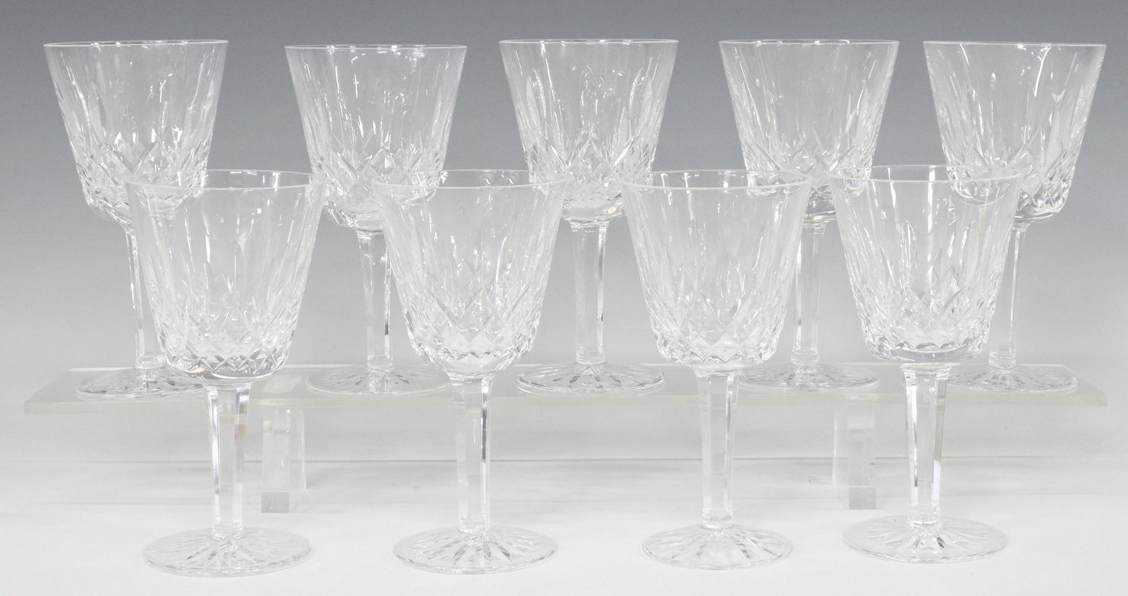 (9) WATERFORD 'LISMORE' CUT CRYSTAL CLARET WINES: (lot of 9) Waterford "Lismore" cut crystal claret wine stems, bearing acid-etched mark underfoot, approx 5.75"h, 3"diam; 5.5lbs total **Provenance: A fine Santa Fe, New Mexico estate collection** Star