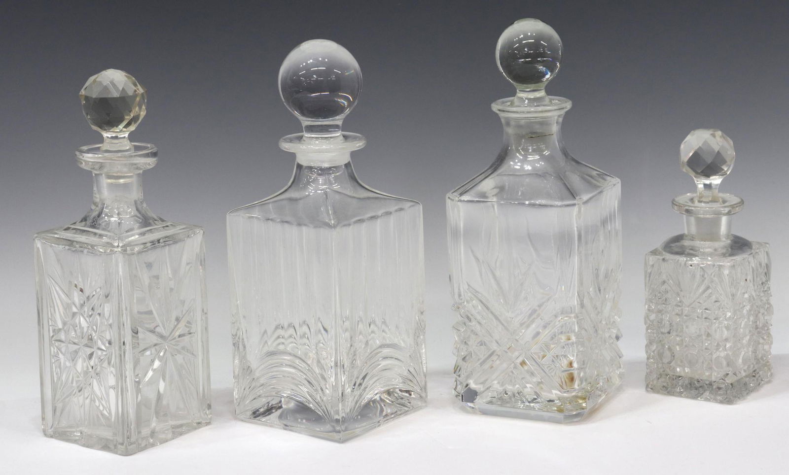 (4) CUT GLASS LIQUOR DECANTERS & STOPPERS (1 of 2)