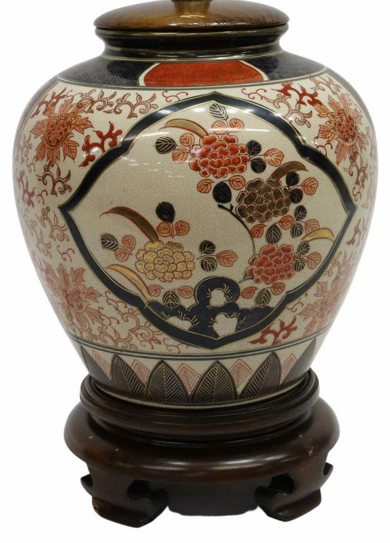 FREDERICK COOPER IMARI PALETTE VASE TABLE LAMP: Frederick Cooper porcelain table lamp, Chicago, decorated in the Imari color palette, having turned wood top and footed base, retaining original maker's tag, approx 17"h, 9"diam, 6lbs **Provenance: A