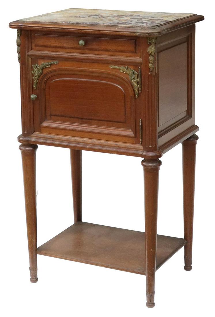 LOUIS XVI STYLE MARBLE-TOP MAHOGANY NIGHTSTAND: Louis XVI style mahogany bedside cabinet, early 20th c., insert marble top, case fitted with a single drawer over cabinet door, interior porcelain liner, fluted corner posts with foliated metal mounts