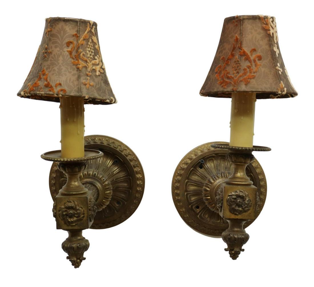 (2) FRENCH BEAU & BERTRAND TAILLET BRONZE SCONCES: (lot of 2) French Empire style bronze wall sconces, Beau and Bertrand Taillet, Paris, late 19th c., circular back, with fluted arm ending in floral medallions, beaded bobeche with faux candle cover, l