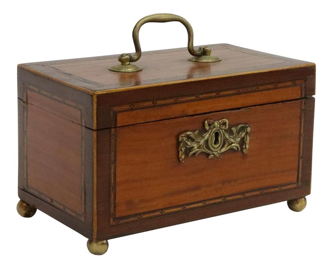 ENGLISH CHIPPENDALE STYLE MAHOGANY TEA CADDY: English Chippendale style mahogany and satinwood tea caddy, 19th c., case accented with fine geometric string inlay, hinged lid with brass bail handle, opening to three removable, lidded compartments,