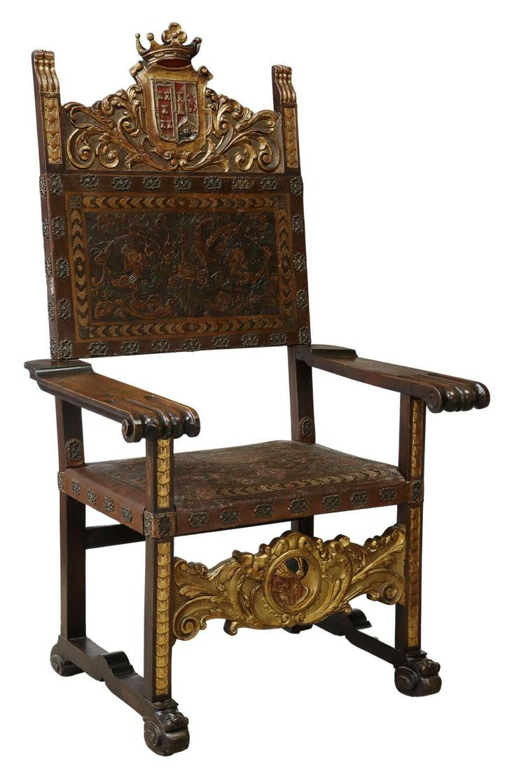 SPANISH BAROQUE STYLE HERALDIC THRONE CHAIR: Spanish Baroque style armchair, 19th c., carved crest of crown over heraldic sheild, with tower, lion rampant, and globus cruciger, wide armrests terminating in scroll handholds, embossed leather held