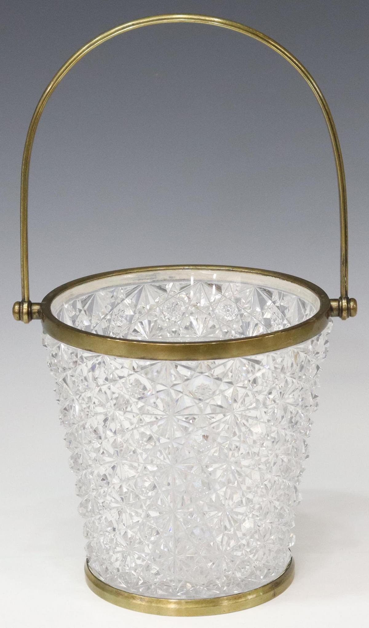 BACCARAT RUSSIAN PATTERN CUT CRYSTAL ICE BUCKET: French Baccarat crystal ice bucket, finely cut Russian pattern, gold-tone metal bail handle and collar, stamped mark in metal mount, approx 6 1/8"h, 6"diam, 3.75lbs **Provenance: A fine Santa Fe, New 