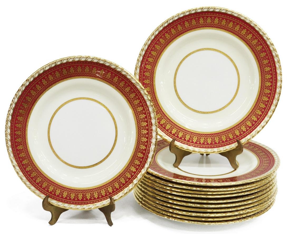 (12) MINTON MAROON & RAISED GILT PORCELAIN PLATES: (lot of 12) English parcel gilt bone china porcelain plates, Minton, early 20th c., each having a burgundy border, with gilded floral accents, raised double band to white ground, approx 10.75"diam; 17