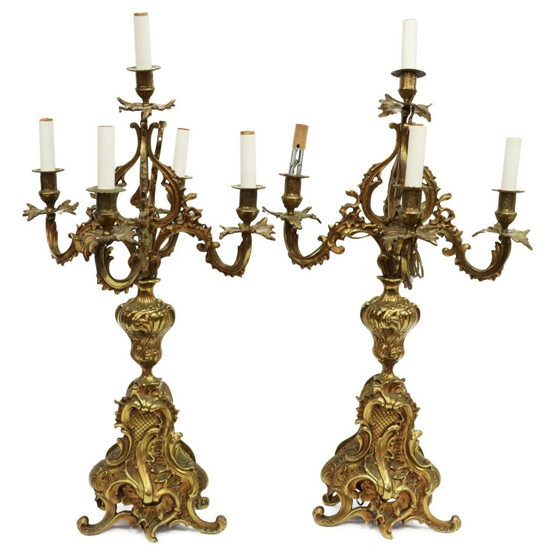 (2) LOUIS XV STYLE BRONZE 5-LIGHT CANDELABRA LAMPS: (pair) Louis XV style gilt bronze five-light candelabra lamps, early 20th c., having curving rocaille scroll arms and footed base with a flat back, in need of wiring, approx 30.75"h, 16"w; 35lbs total