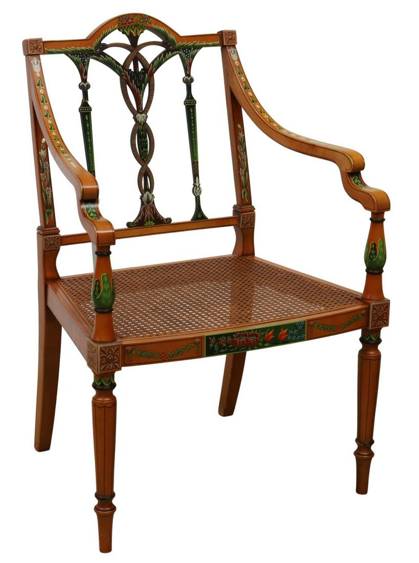 REGENCY STYLE PAINT DECORATED CANE SEAT ARMCHAIR: English Regency style paint decorated armchair, late 20th c., entwined serpent back splat, arms accented with trailing bellflowers, over cane seat, rising on turned front legs, saber back legs, approx