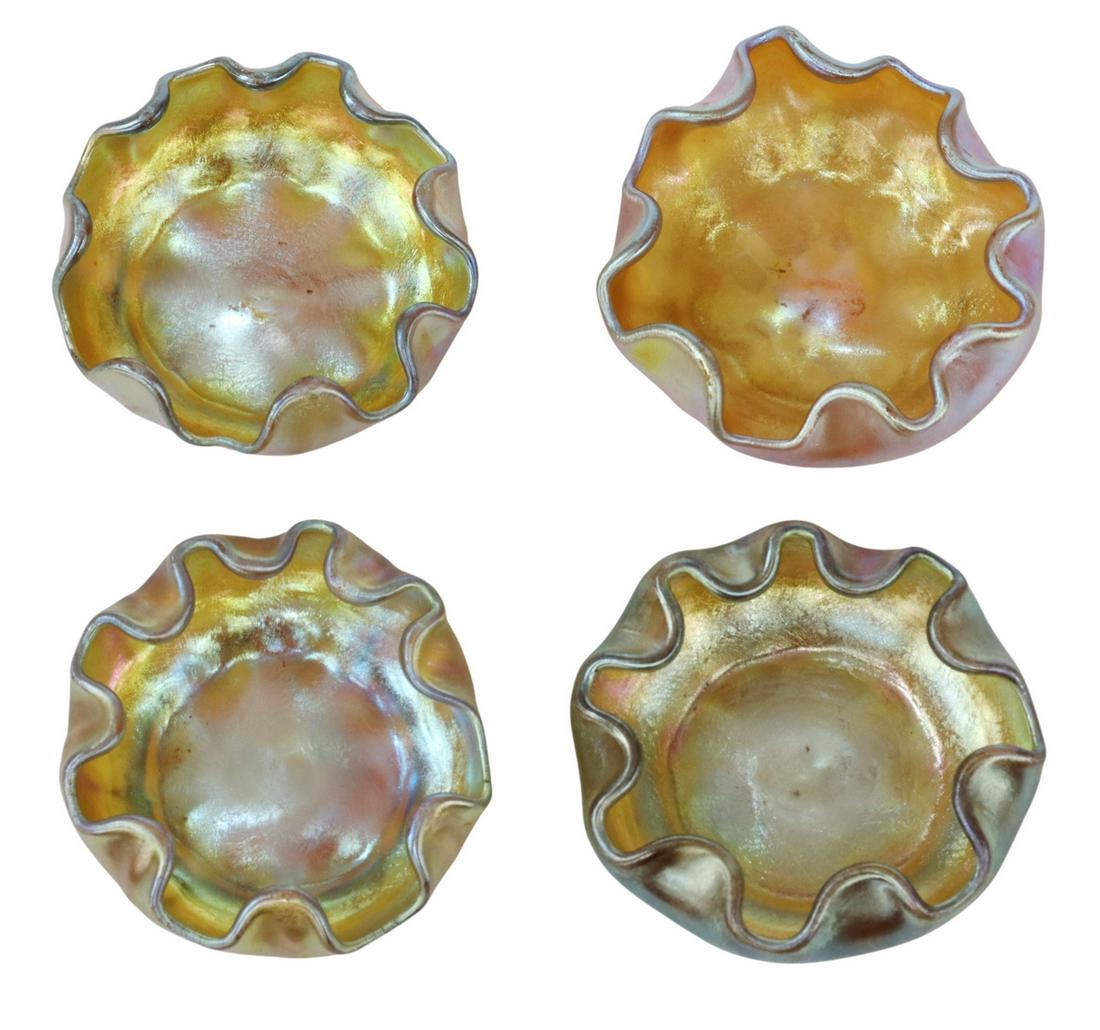 (4) L.C. TIFFANY GOLD FAVRILE ART GLASS OPEN SALTS: (lot of 4) Favrile art glass open salt cellars, Louis Comfort Tiffany (New York, 1848-1933), early 20th c., iridescent gold glass, with ruffled edge, engraved signature "L.C.T." underfoot, (one) with 