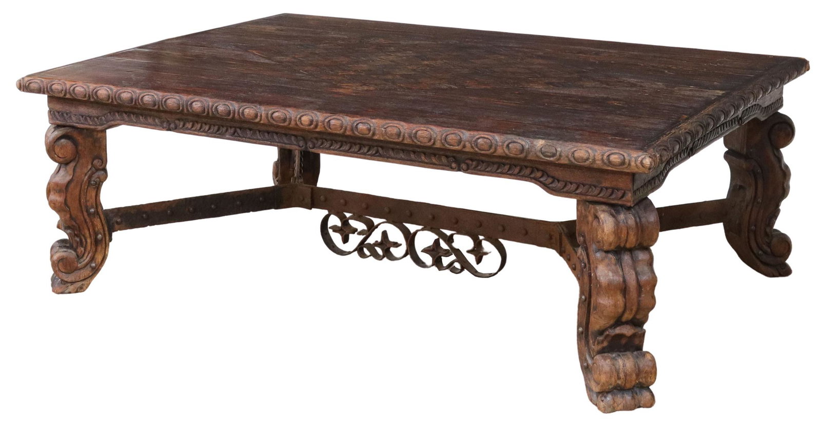 LARGE RUSTIC BAROQUE STYLE COFFEE TABLE, 60"L: Large Baroque style coffee table, late 20th c., top with center diamond parquetry, rising on substantial scrolled legs, joined by iron cross stretcher, approx 21"h, 60"w, 42"d **Provenance: A fine San