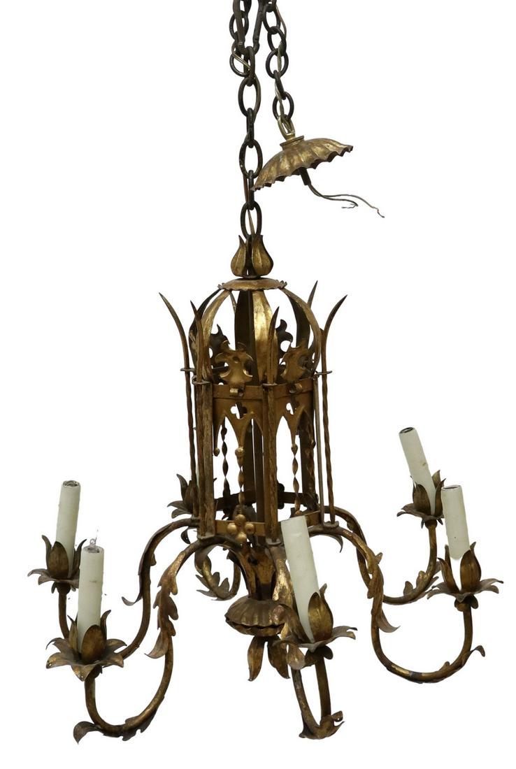GOTHIC REVIVAL GILT IRON SIX-LIGHT CHANDELIER: Gothic Revival gilt iron six-light chandelier, early 20th c., standard with pierced quatrefoils, pointed arches, issuing six scrolling foliate arms, each ending in bobeche and faux candle, approx 21.5