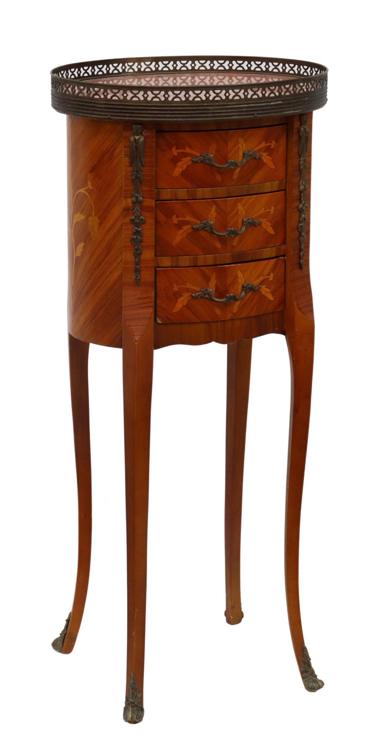 FRENCH LOUIS XV STYLE MARBLE-TOP NIGHTSTAND: French Louis XV style marble-top nightstand, 20th c., oval marble top framed by pierced metal gallery, over floral marquetry and parquetry case with foliate mounts, fitted with three drawers, rising o