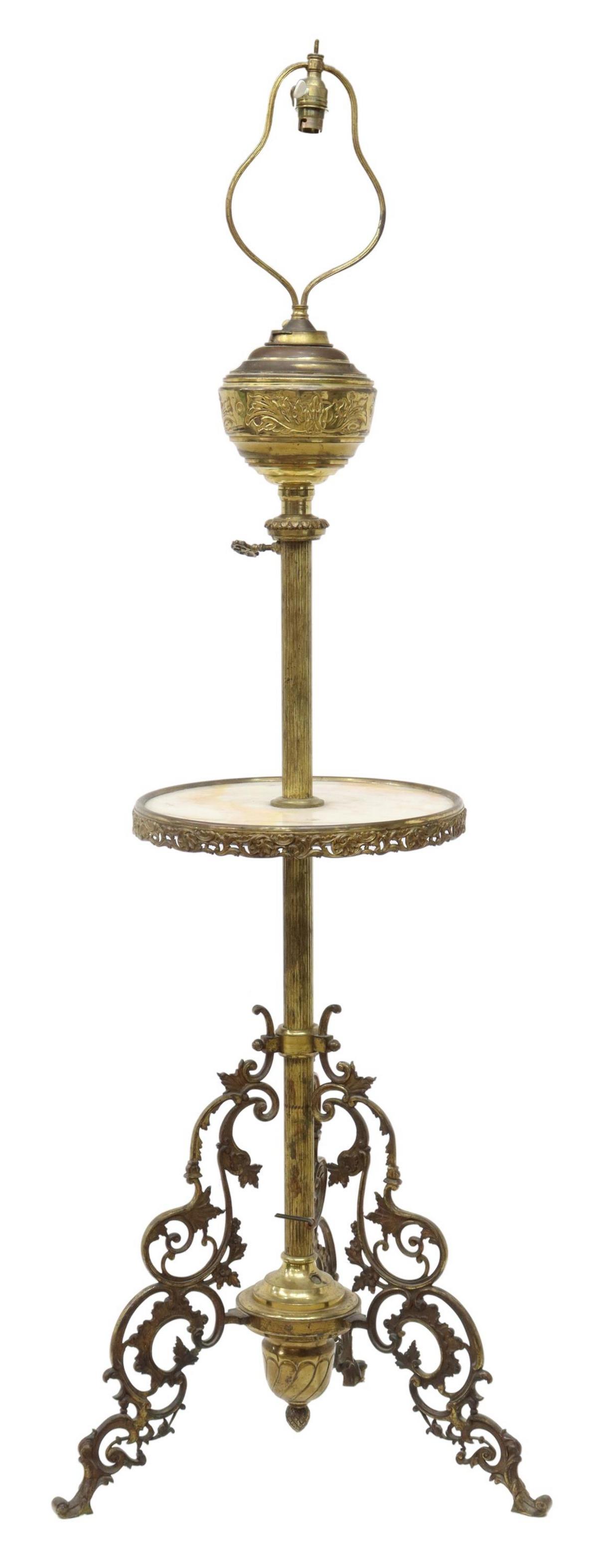 VICTORIAN GILT METAL & ONYX PIANO LAMP: Victorian gilt metal piano lamp, 19th c., originally fitted for oil, now electrified, one light, drop-in font with chased foliates, onyx-top table, rising on three scrolled legs, in need of wiring, ap