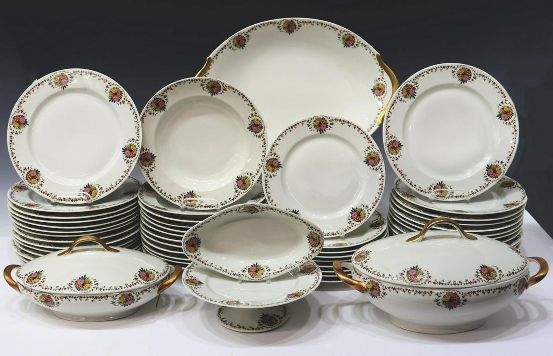 (54) FRENCH RAYNAUD LIMOGES PORCELAIN DINNER SET: (lot of 54) French Limoges porcelain dinner service, Raynaud & Co., 20th c., with floral border, including: (28) dinner plates, 10"diam, (12) soup bowls, 9.75"diam, (9) salad plates, 9"diam, (1) relis