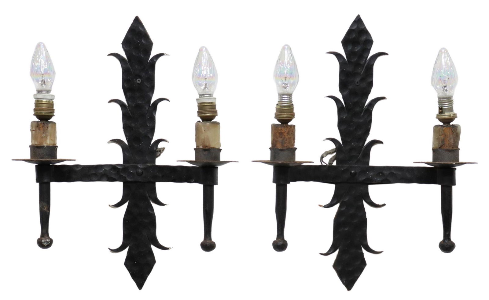 (2) GOTHIC STYLE METAL TWO-LIGHT WALL SCONCES: (lot of 2) Gothic style metal two-light wall sconces, foliate-form back, curved arms ending in two bobeches, faux candle covers, in need of wiring, approx 20"h, 15.5"w, 6"d **Provenance: A fine Santa