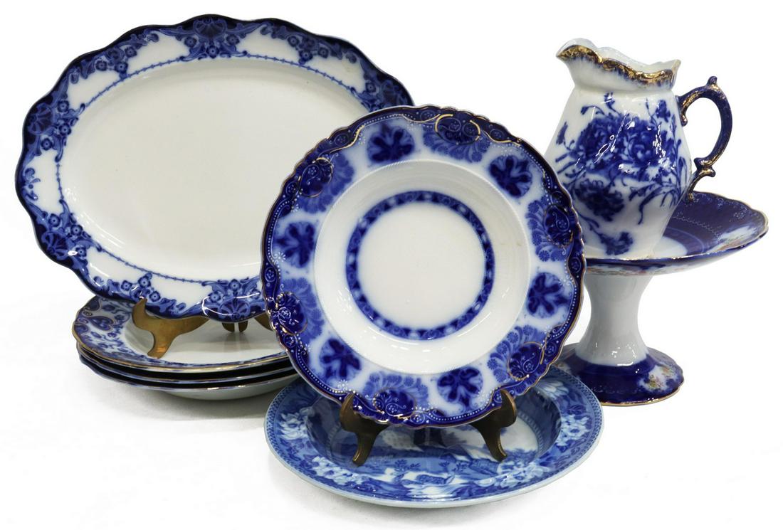 (8) ENGLISH FLOW BLUE & STAFFORDSHIRE TABLEWARE: (lot of 8) English flow blue tableware, early 20th c., each bearing maker's mark underfoot, comprising: (1) Royal Doulton oval platter, in the "Egerton" pattern, c.1902-1922, having scalloped edges wi