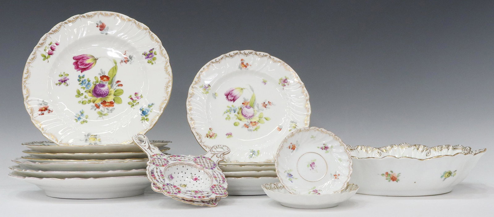 (17) DRESDEN FLOWERS STYLE PORCELAIN TABLEWARE: (lot of 17) Dresden Flowers style porcelain tableware items, various makers including: Charles Ahrenfeldt Saxonia, Dresden Franziska Hirsch, and Schlesische Porzellanfabrik Louis Levinsohn, including: