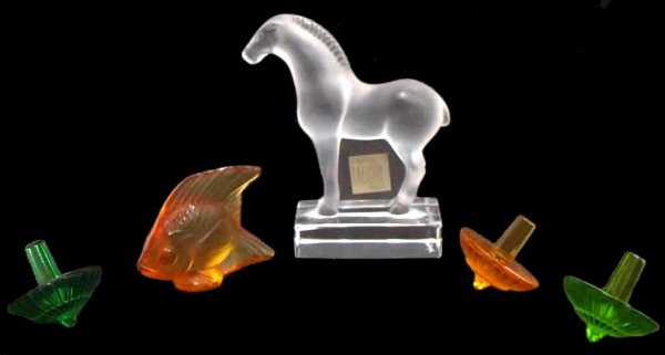 LALIQUE SIGNED GROUP (5) HORSE, FISH, SPIN TOPS: (lot of 5) French frosted glass sculpture on clear base, signed Lalique France, 3.75"h, 3.5"w, 1.5"d; French amber glass fish sculpture, signed Lalique France, 1.75"h, 2"w, .75"d; (3) French glass spi