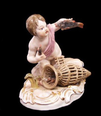 MEISSEN PORCELAIN FIGURE BOY WITH FISH BASKET: Meissen porcelain figure, mid 19th/early 20th c., modeled as a boy holding fish with an eel basket beside him on a gilt base, incised 'c98' on rock behind boy, marked with blue crossed swords undergla