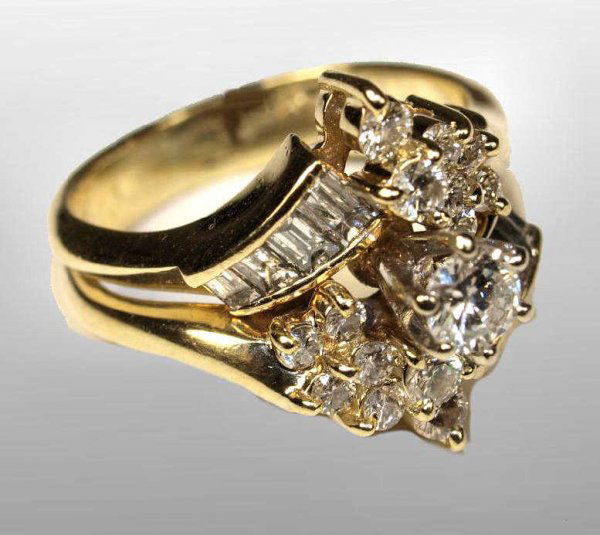 FINE LADIES 14KT GOLD & DIAMOND WEDDING BAND SET: Ladies 14kt gold and diamond wedding set, the set soldered together and set with a total of (23) diamonds, 1 1/4 ct. tw, 5.3 grams tw, size 5