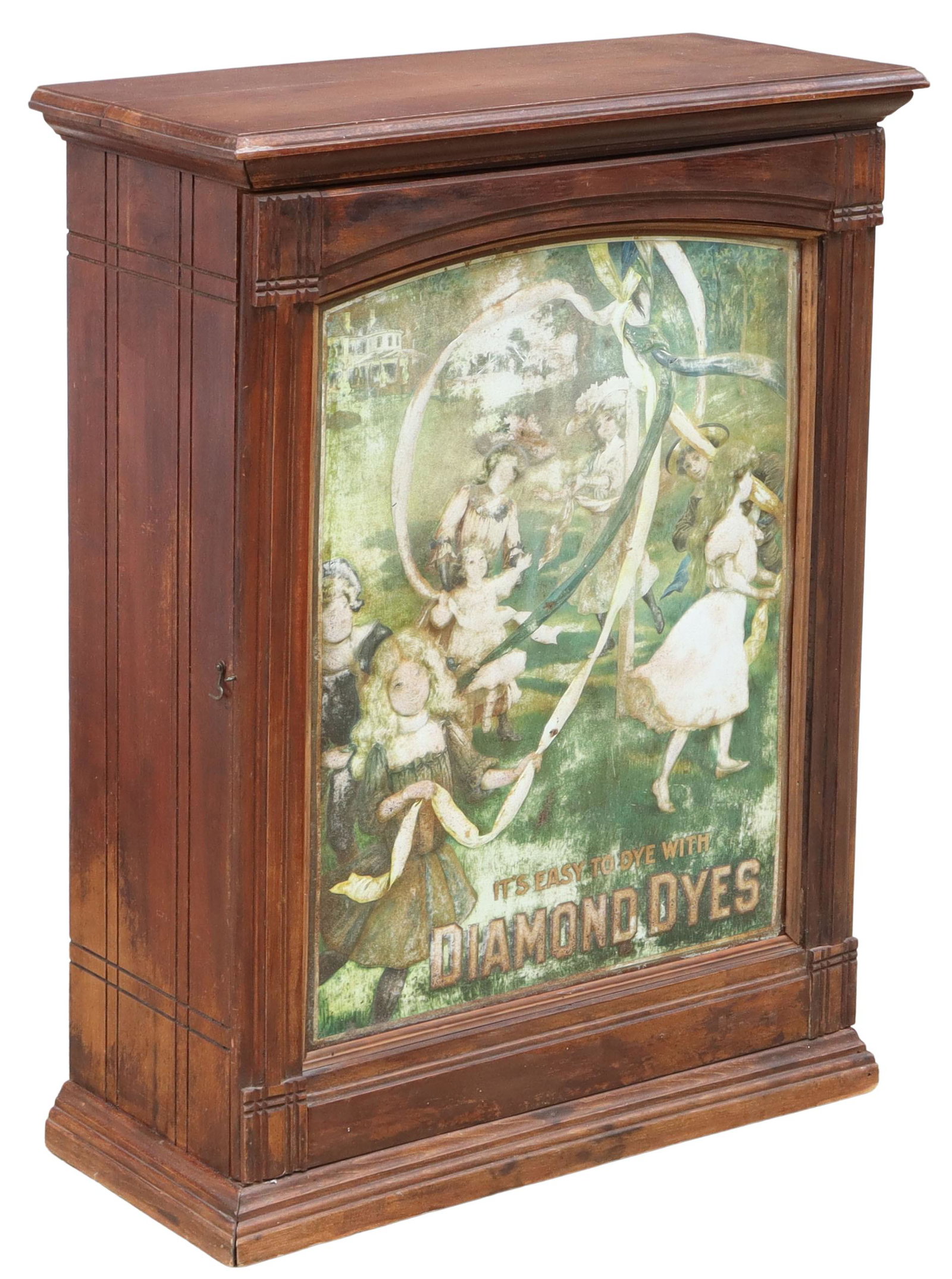 AMERICAN OAK DIAMOND DYES MERCHANTS CABINET: American Diamond Dyes general store countertop display cabinet, early 20th c., carved oak case, door with inset faded tin lithograph advertisement of children dancing around a Maypole, opening to smal