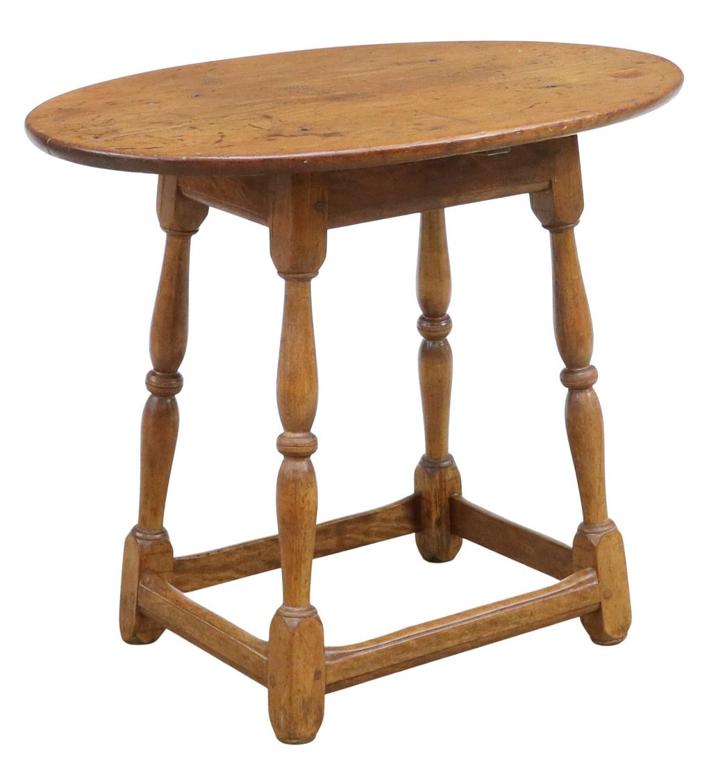 AMERICAN FRUITWOOD OVAL TAVERN TABLE, EARLY 19TH C: American fruitwood tavern table, early 19th c., having oval top with iron nail heads, over stretcher-joined turned legs, ending in block feet, displaying peg joinery, approx 24.5"h, 30.5"w, 21"d **Pro