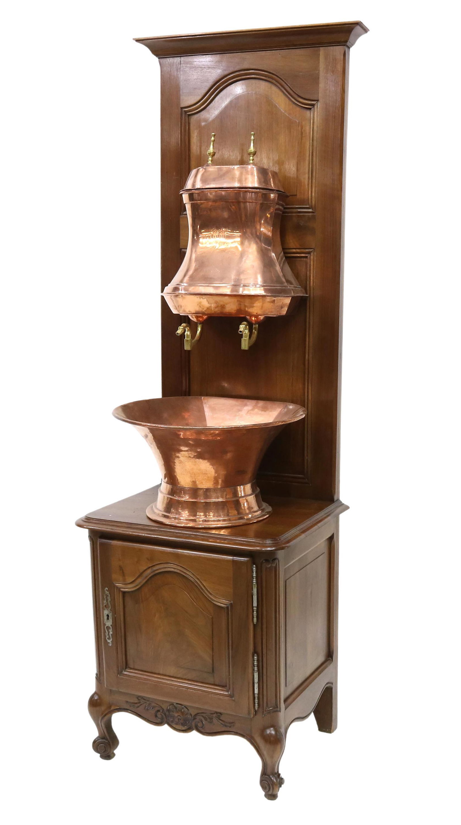 FRENCH PROVINCIAL COPPER LAVABO FOUNTAIN ON STAND: French Provincial copper lavabo fountain on walnut cabinet, late 19th c., brass finials on the lidded copper vessel with etched flower motifs, issuing two brass spigots over copper basin, all mounted 