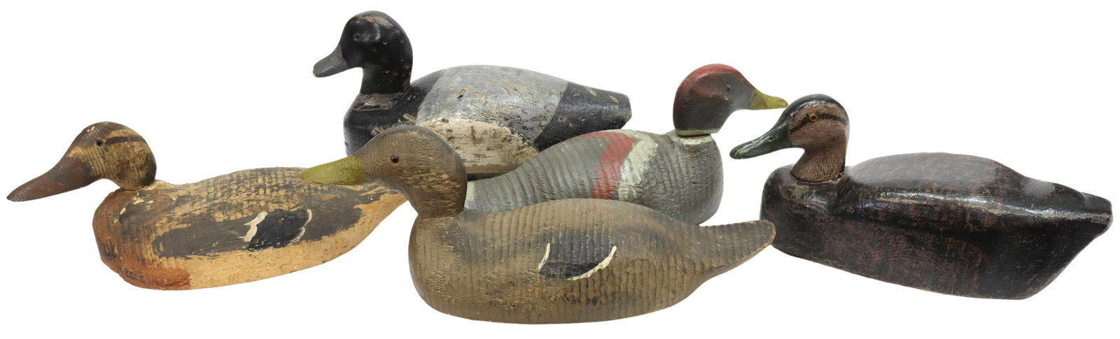 (5) VINTAGE DUCK DECOYS, HAND CARVED & PAINTED: (lot of 5) Vintage hand-carved and painted duck decoys: (1) mallard with wood keel and lead weights; (1) red head with lead weight; (1) black duck with lead weights; (1) black duck with two hollow sec