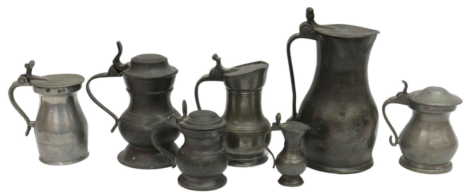 (7) ANTIQUE PEWTER MEASURES & TANKARDS: (lot of 7) Antique pewter measures and tankards, dates ranging from 17th-19th c., comprising: (1) small measure, Germany, with double acorn finials, touch marks depicting angel with trumpet and crest