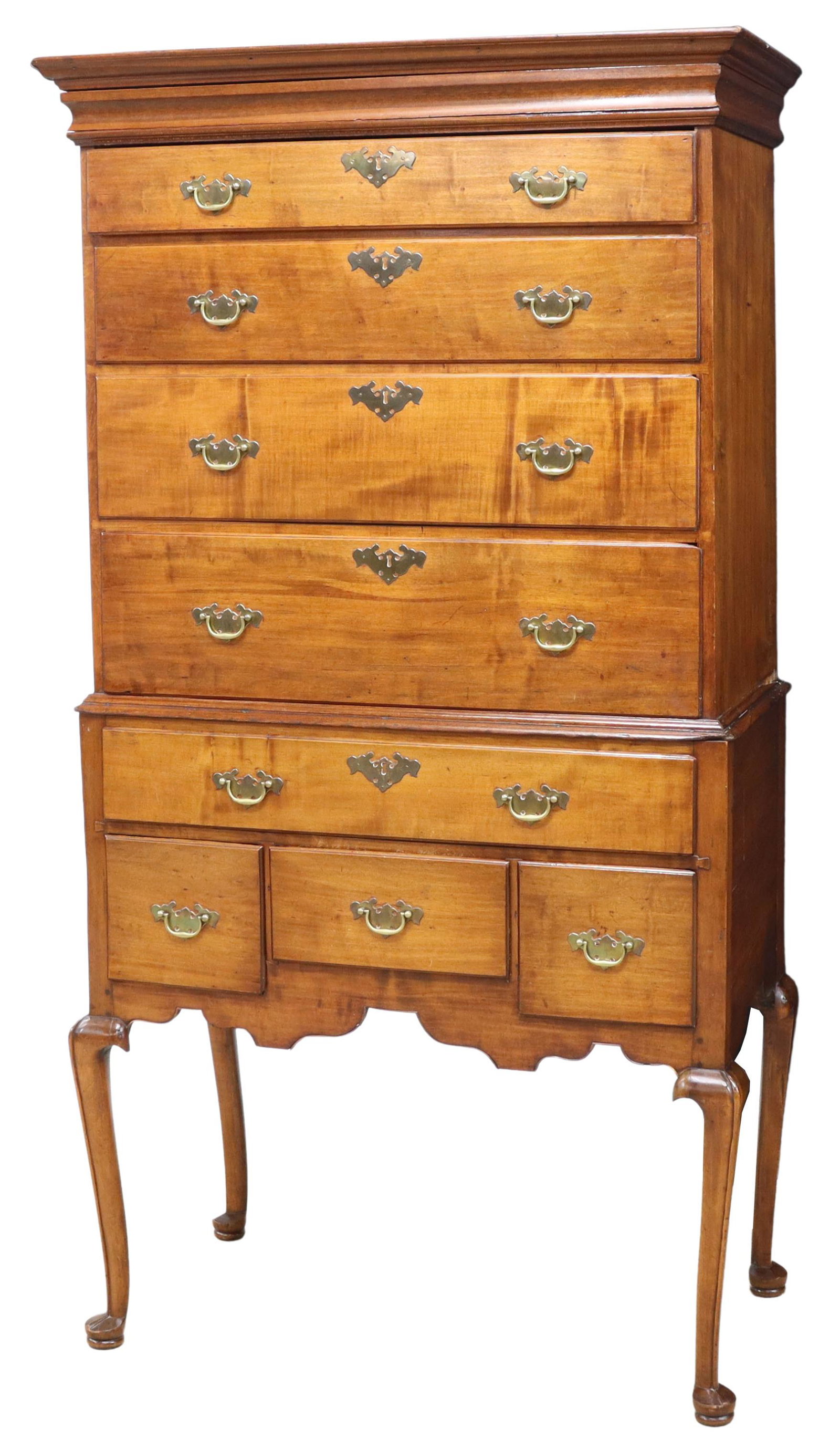 NEW HAMPSHIRE QUEEN ANNE MAPLE HIGHBOY 18TH C.: American Queen Anne maple highboy chest on chest, New Hampshire, 18th c., molded cornice over concealed frieze drawer, upper case fitted with four drawers, seated on stand with four additional drawers