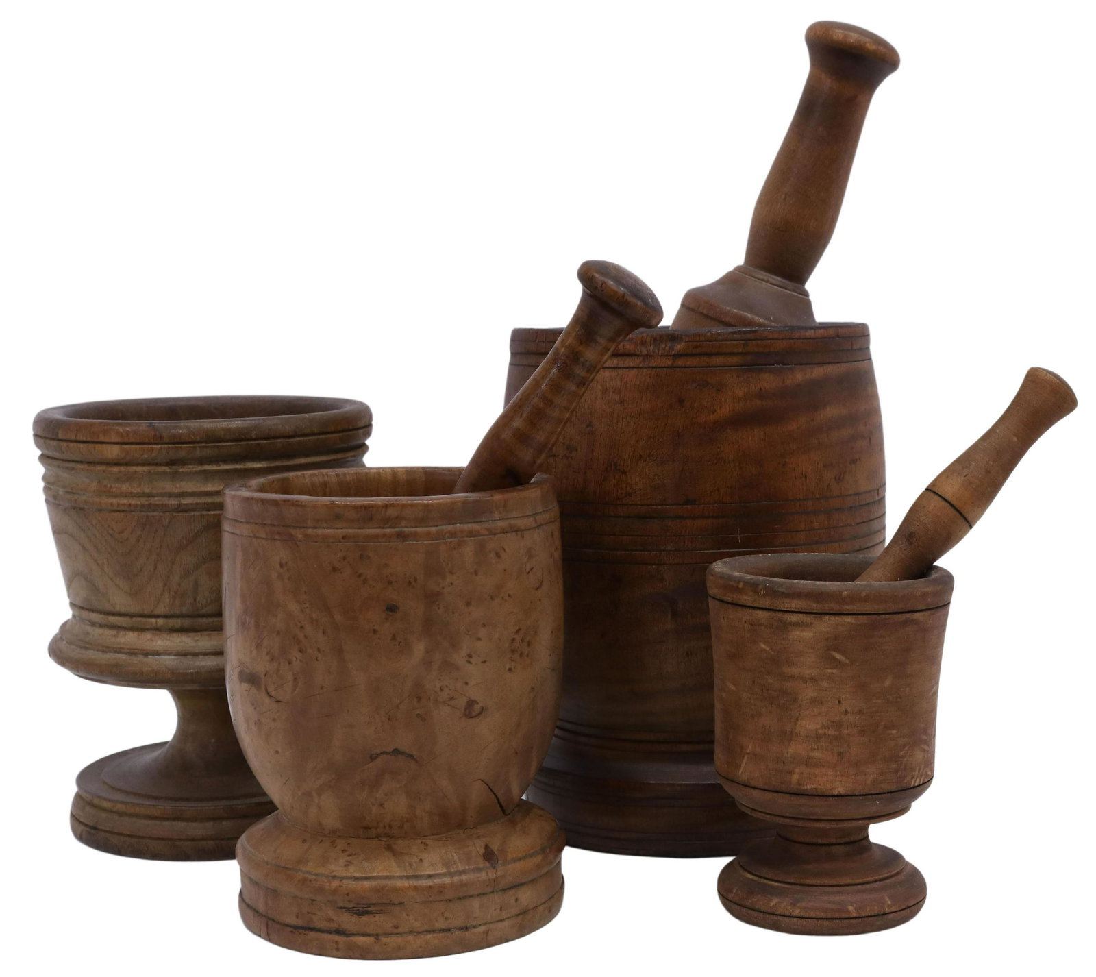 (4) TREENWARE TURNED WOOD MORTARS & PESTLES: (lot of 4) Treenware mortars and pestles, 19th c., including: (1) burlwood mortar, with tiger maple pestle, mortar: 5.5"h, 4.25"diam, pestle: 7"l, (1) footed mortar, likely elm, small chip to foot, 6.