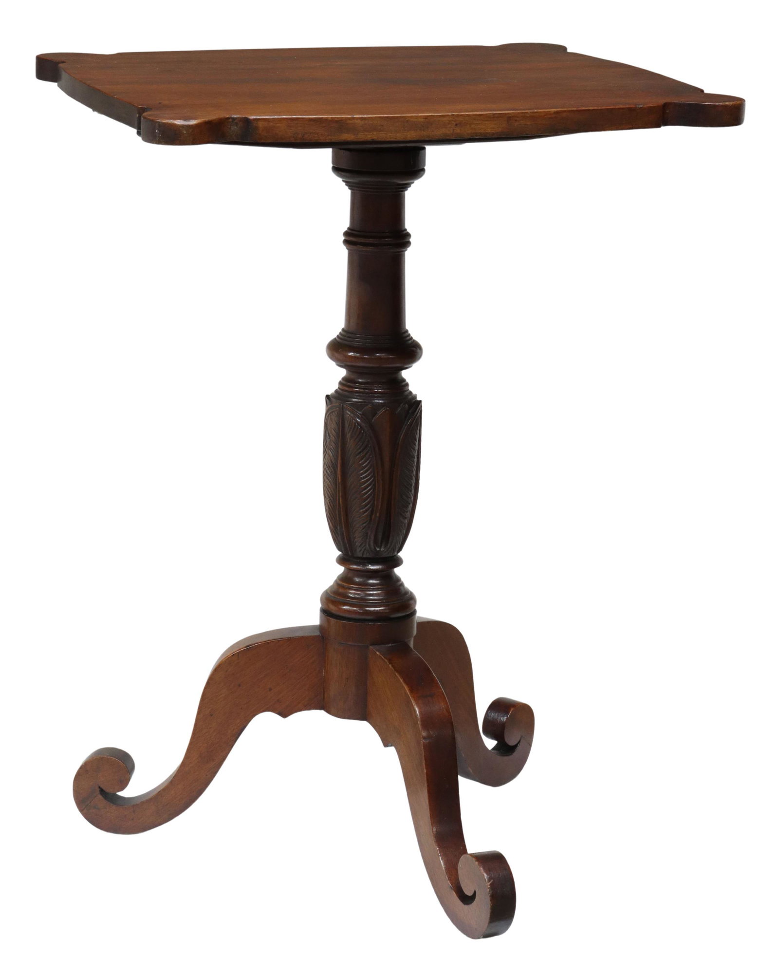 AMERICAN CARVED MAHOGANY TEA TABLE: American mahogany tea table, 19th c., shaped tabletop, turned center pedestal with carved acanthus leaves, rising on three scrolled legs, approx 27.5"h, 20"w, 16.75"d **Provenance: through our consign