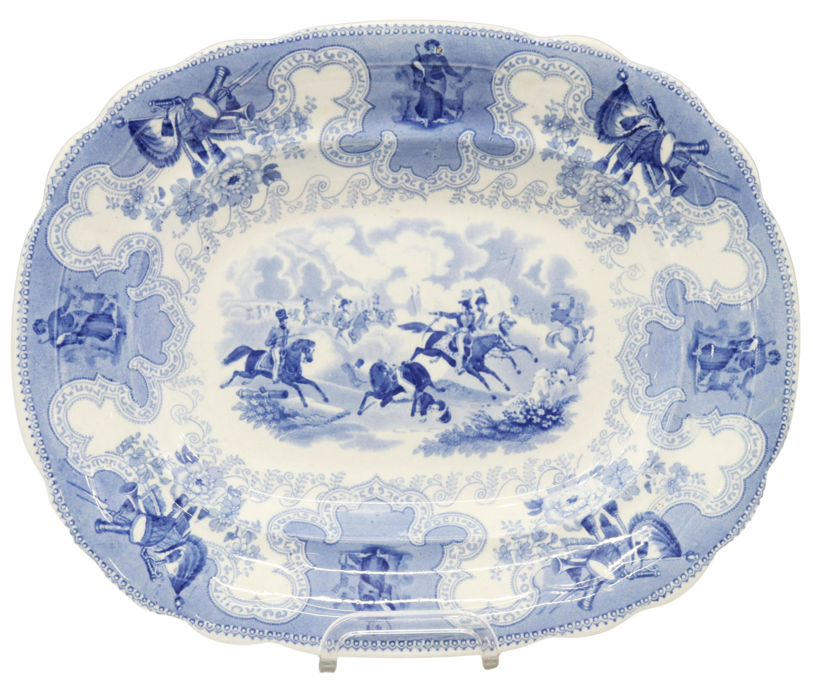 HISTORICAL STAFFORDSHIRE TEXIAN CAMPAIGNE PLATTER: Scarce English Staffordshire serving platter, in the "Texian Campaigne" pattern, James Beech, c.1850, with light blue transfer printed decoration, depicting officers and soldiers in retreat, marked un