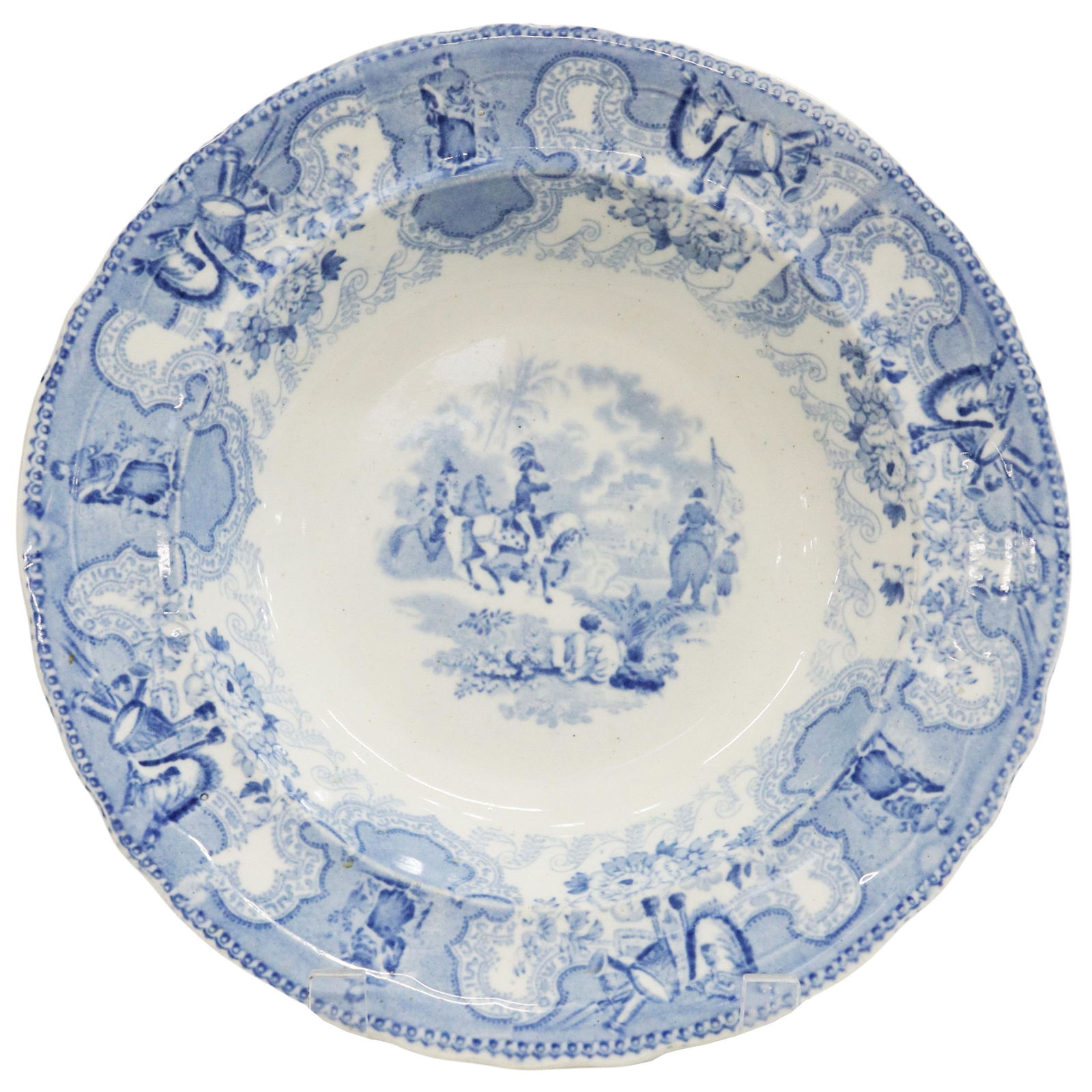 HISTORICAL STAFFORDSHIRE TEXIAN CAMPAIGNE BOWL: Scarce English Staffordshire soup bowl, in the "Texian Campaigne" pattern, James Beech, mid 19th c., with blue transfer printed decoration, depicting General Zachary Taylor at the Battle of Chapultepe