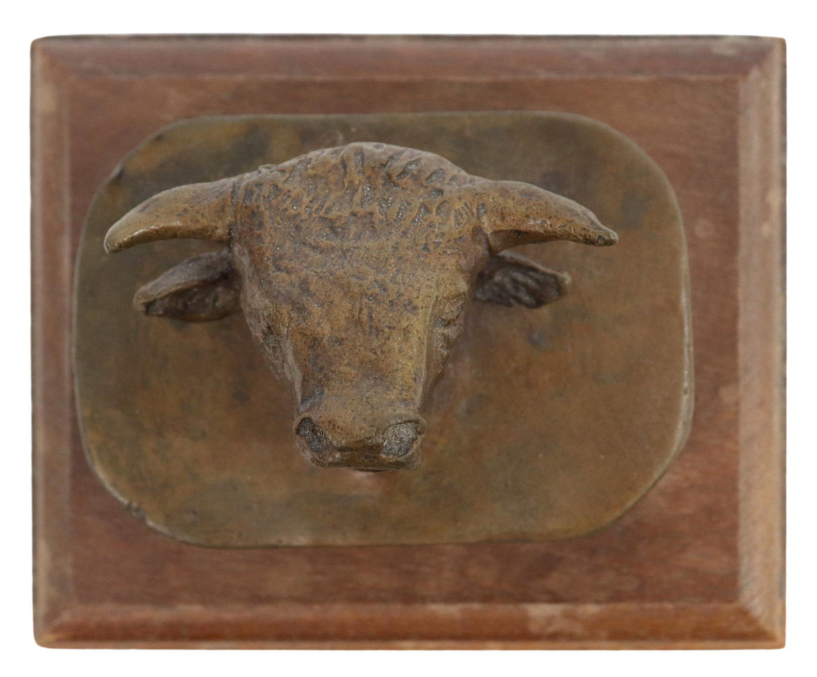 AFTER C.M. RUSSELL (1864-1926) BRONZE BULL'S HEAD: Patinated bronze sculpture, Bull's Head, signed in cast after C.M. Russell (Charles Marion Russell, American, 1864-1926), bronze: approx 2.5"h, 3.25"w, 2.25"d, overall: 3.25"h, 4.5"w, 3.5"d, 1.5lbs St