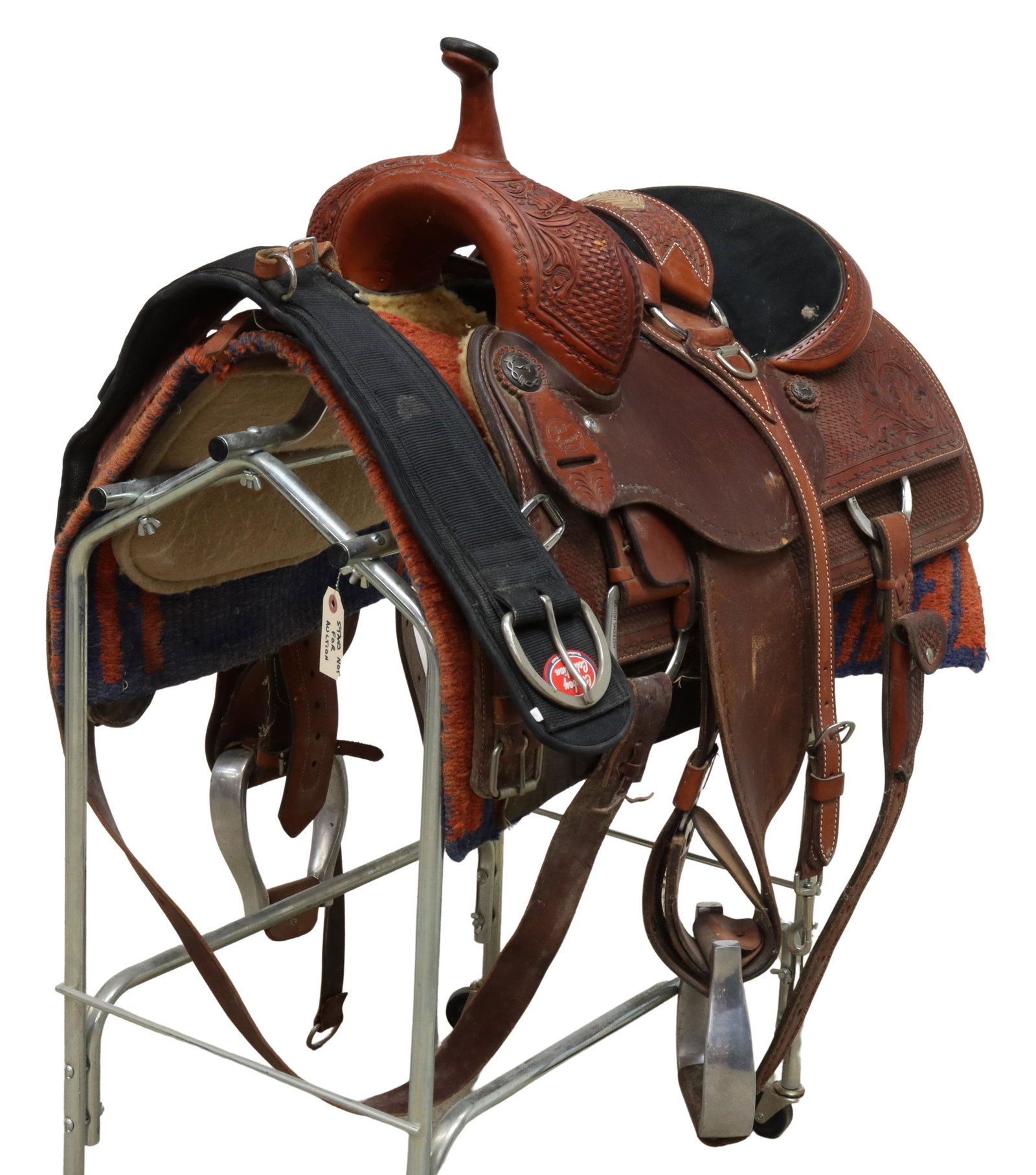 MATT GAINES WESTERN CUTTING SADDLE: Western cutting saddle, Matt Gaines, 16" seat, longhorn conchos, Classic Equine wool top leather accented saddle blanket (stand not included in sale) **Provenance: A fine Santa Fe, New Mexico estate c
