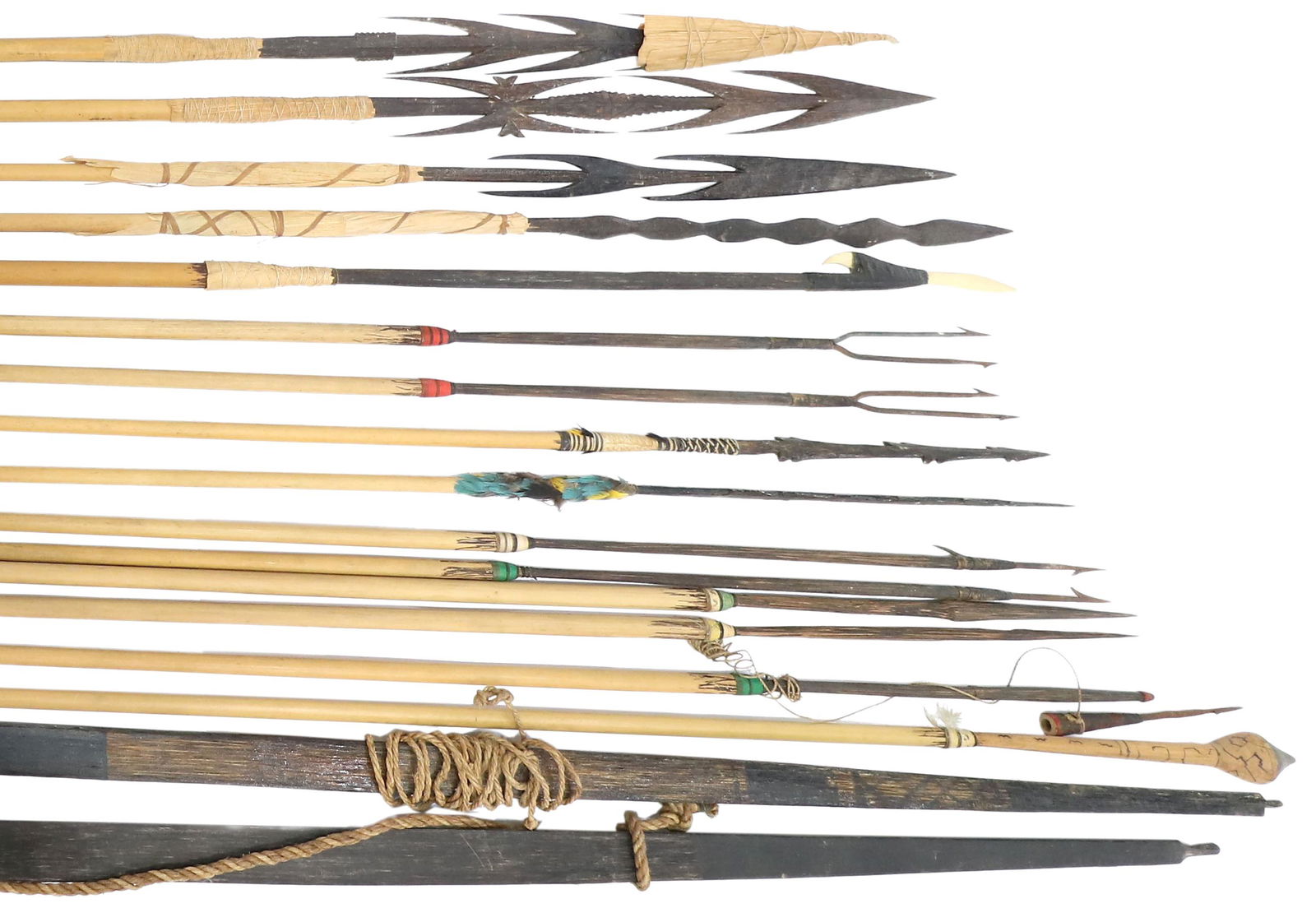 (16) PERU AMAZON TRIBAL BOWS & ARROWS: (lot of 16) Peruvian Amazon tribal bows and arrows: (14) arrows up to 73"l, extremely sharp wood arrowheads; (2) wood bows Start Price: $80.00