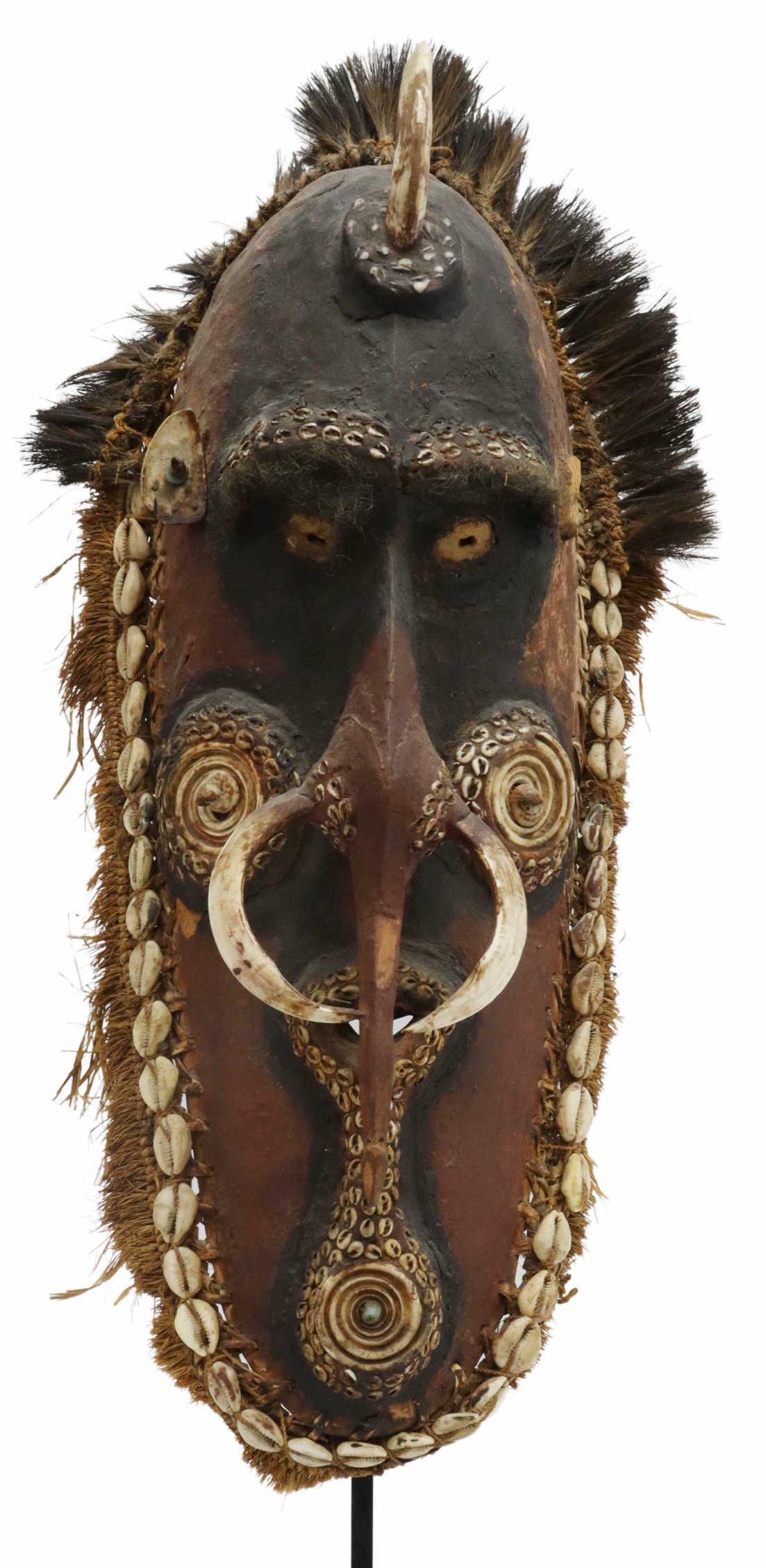 PAPUA NEW GUINEA SEPIK RIVER CARVED WOOD MASK: Papua New Guinea Sepik River figural mask, Angoram Peoples of the Kanduanam or Maramba village, mid 20th c., carved wood elongated oval visage with long nose, decorated with polychrome pigment, clay,