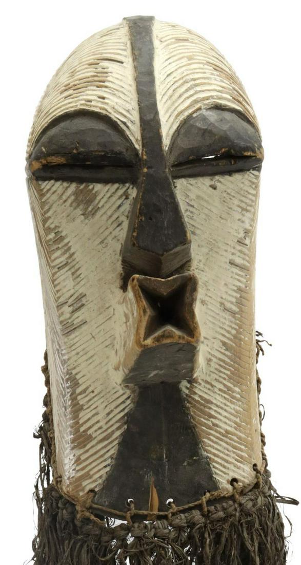 CONGO SONGYE KIFWEBE CARVED & PIGMENTED WOOD MASK: African Kifwebe figural mask, Songye peoples, Democratic Republic of the Congo, early 20th c., wood visage having pierced oval eyes, triangular nose and protruding open rectangular mouth, decorated in