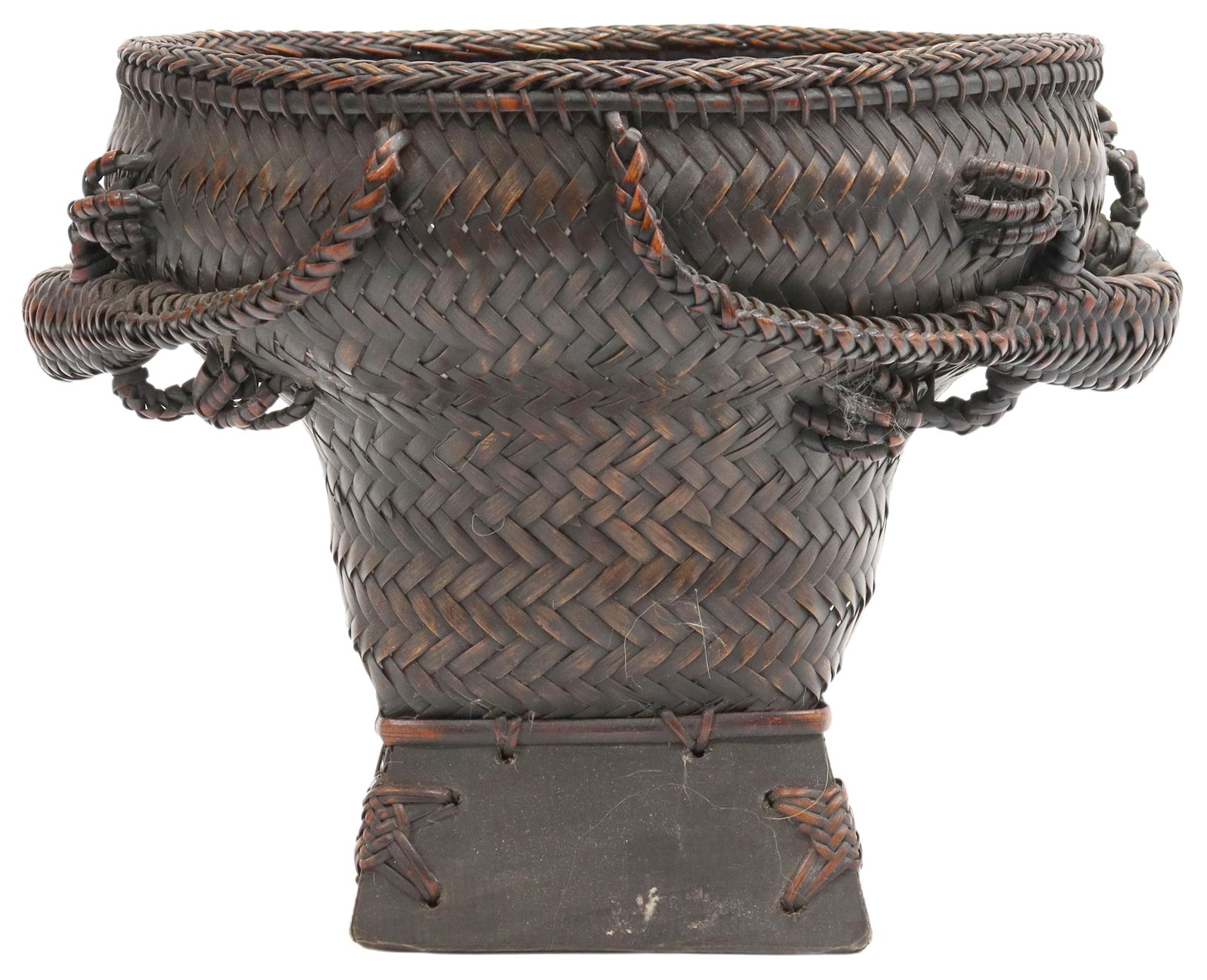 LOMBOK ISLAND INDONESIAN FIGURAL BASKET: Indonesian basket from Lombok Island, 2nd-3rd quarters 20thc,m with wood base and figural handles Start Price: $20.00