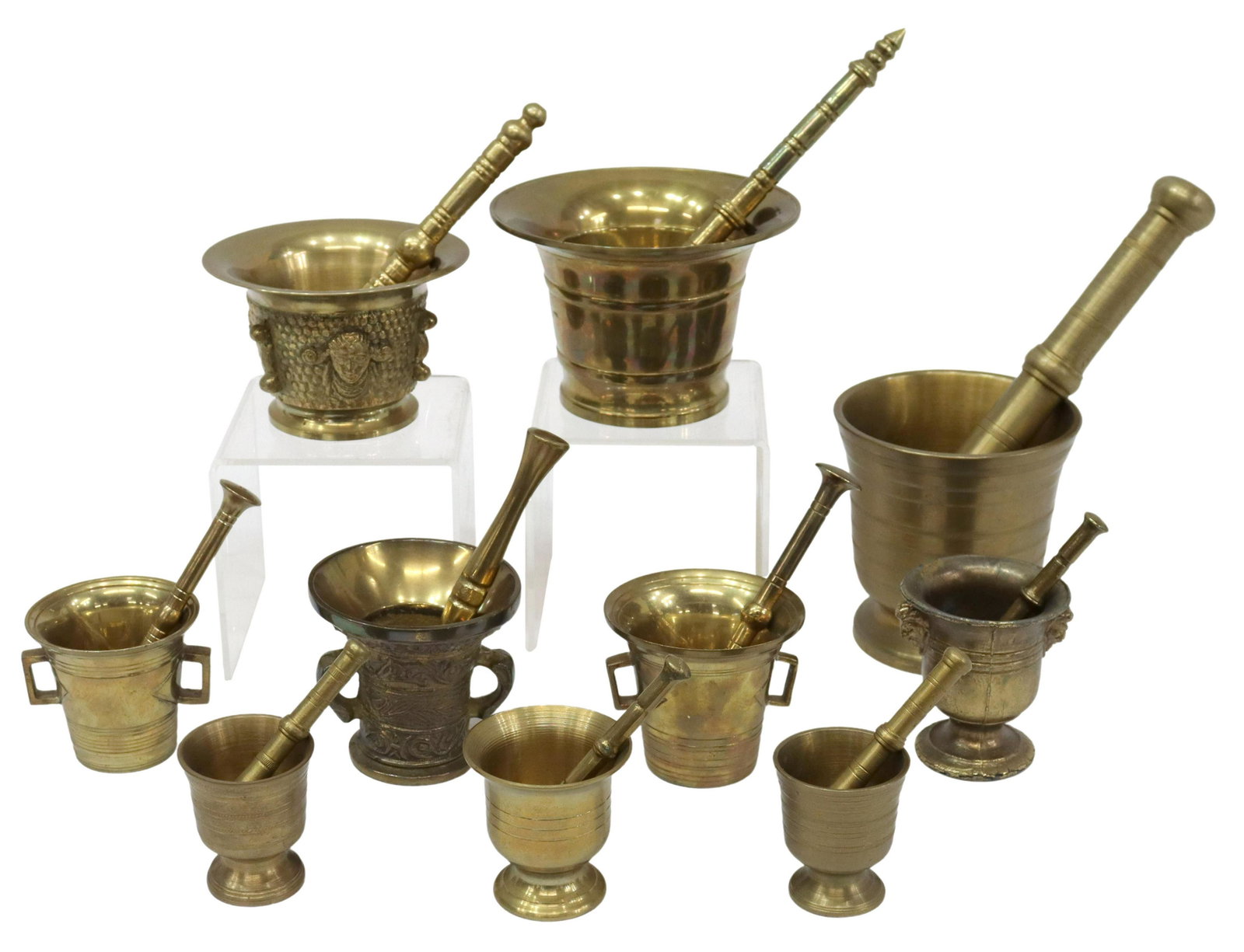 (10) CONTINENTAL METAL MORTARS & PESTLES: (lot of 10) Continental metal mortars and pestles, most in brass, various sizes and makers including: Swedish Konsthantverk Hemslojd Presentartiklar and HSB, highlights include: (one) having relief fo