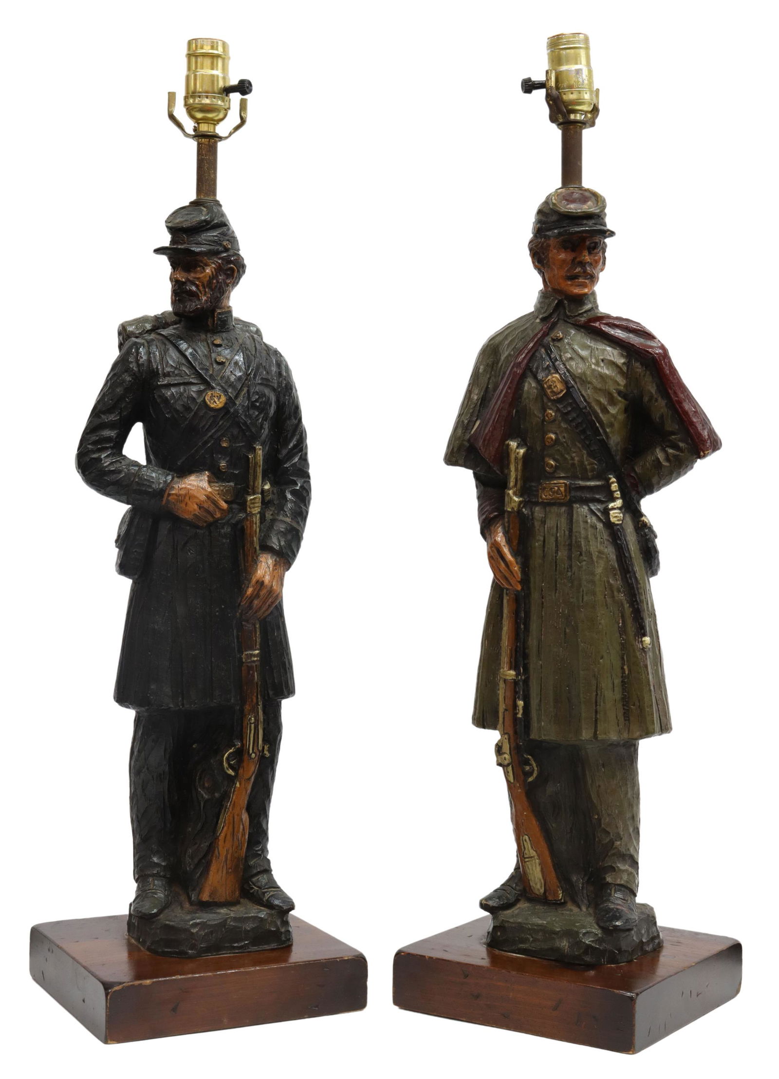 (2) DUNNING INC. CIVIL WAR SOLDIER TABLE LAMPS: (pair) Civil War soldier table lamps, Dunning Industries Inc., c.1971, polychrome painted composite uniformed figures, comprising: (1) Union soldier; (1) Confederate soldier; each rising on a square w