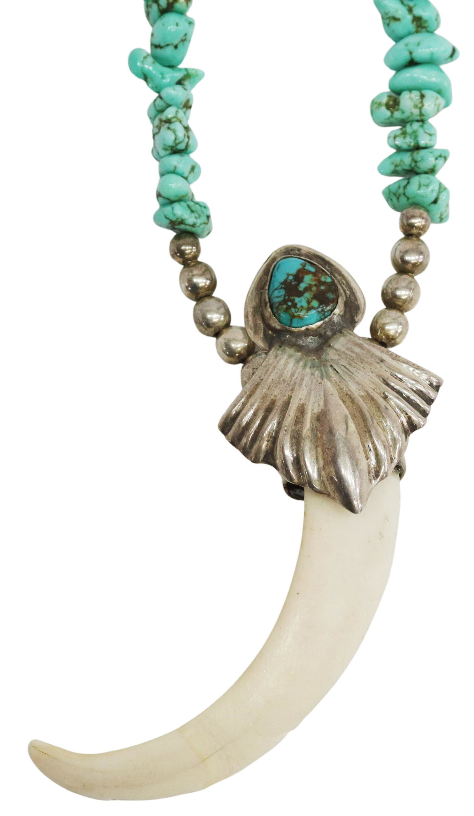 NATIVE AMERICAN SILVER, TURQUOISE & TUSK NECKLACE: Native American silver (content unknown) and turquoise necklace, central pendant with bezel set turquoise stone, issuing a small curved tusk, on a strand comprised of silver and turquoise, approx 21.7