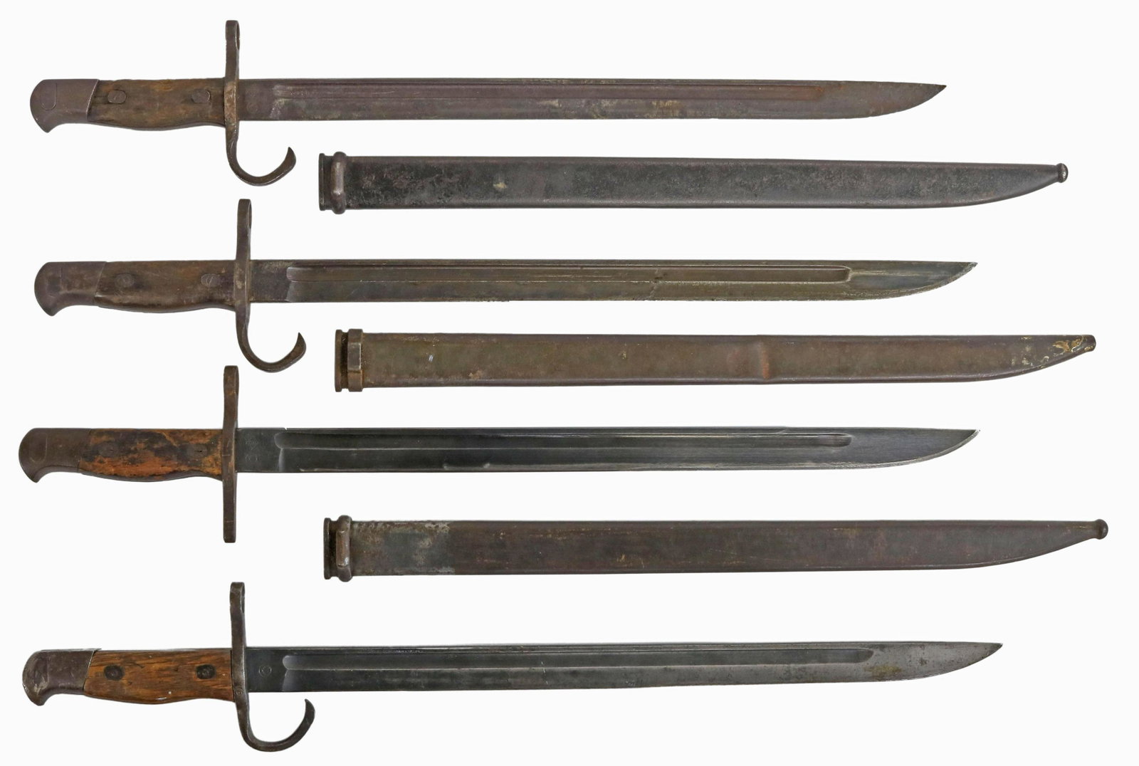 (4) JAPANESE BAYONETS FOR TYPE 30, 39, 99 RIFLES: (lot of 4) Japanese Model 1898 bayonets for use with Type 30, 39 and 99 rifles, including WWII use, each with an arsenal marks including Nagoya, Kokura, (two) with Toyoda Automatic Loom Co. markings, 