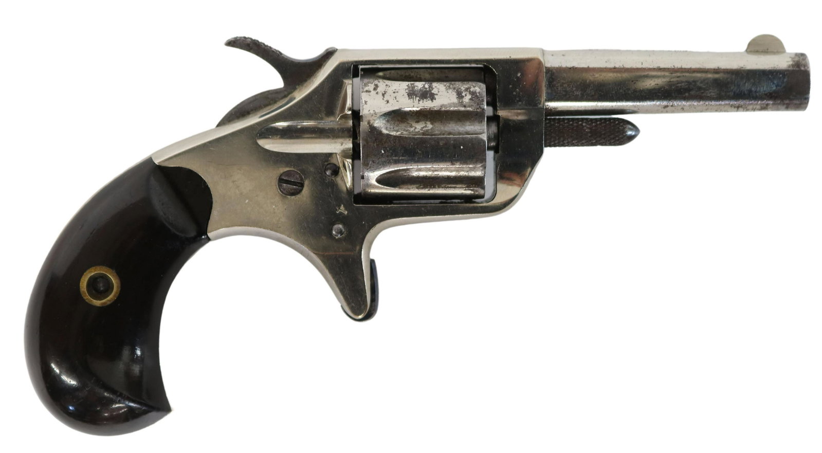 COLT NEW LINE .22 REVOLVER, MFG. 1876: Colt's New Line ,22 caliber revolver, 2.25" barrel marked at top on two lined "Colts PT. F.A. Mfg. Co., Hartford, Ct, U.S.A., left side barrel marked "Colt New 22", 7 round cylinder, nickel finish, ro