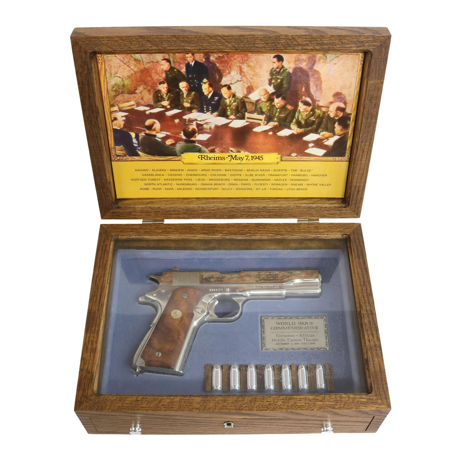 COLT M1911 CASED WWII COMMEMORATIVE PISTOL, .45: Colt Model 1911 pistol, engraved "World War Commemorative European Theater of Operations" and geographic areas including Normandy, Bastogne, Remagen, Berlin and others, .45 Auto caliber, 5" barrel, fo